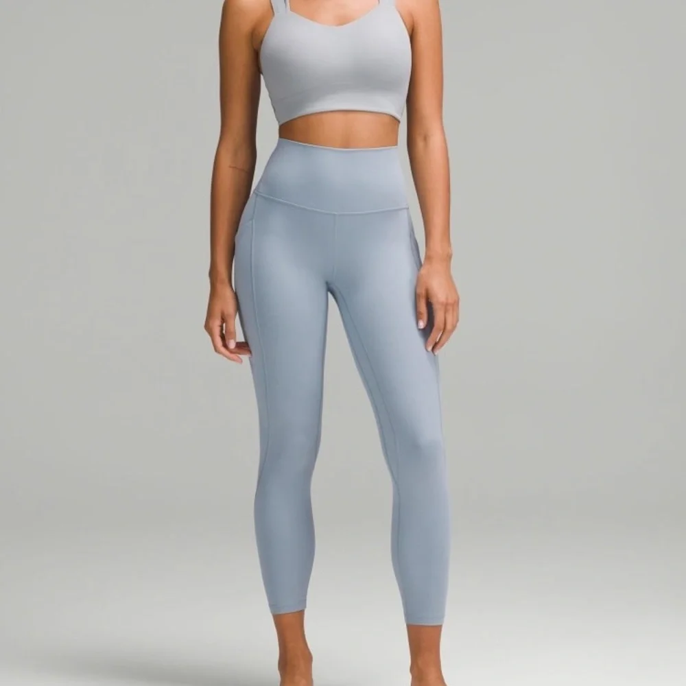lululemon light blue high-rise leggings with center back logo